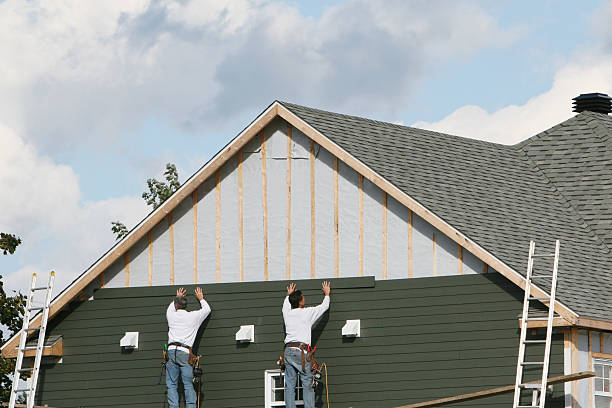 Professional Siding Installation technician working in Westmont, IL